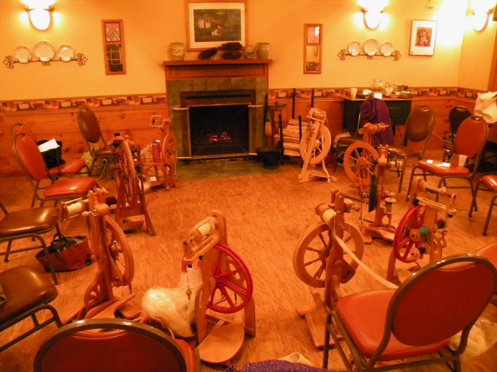 Spinning Wheels around the fireplace at East Hill Farm retreat
