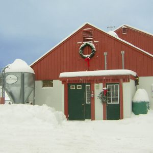 Barn at East Hill Farm covered in snow in the dead of winter