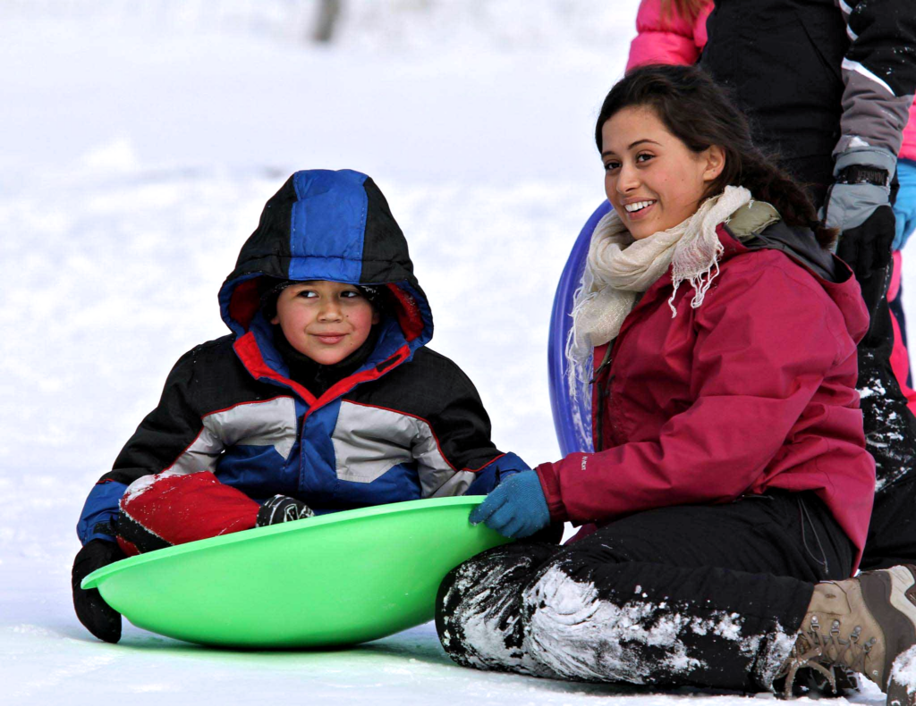 getting ready to go sledding at east hill farm